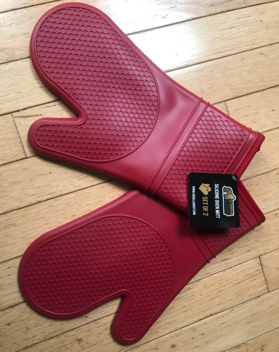 the best kitchen gadgets are these red silicone oven mitts