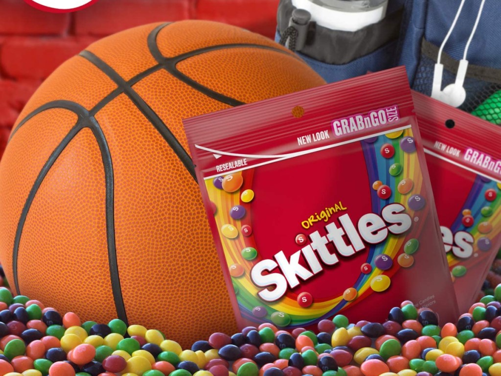 skittles bags next to a basketball