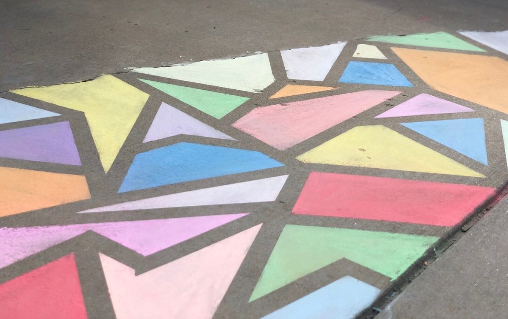 bright colors of chalk on sidewalk 