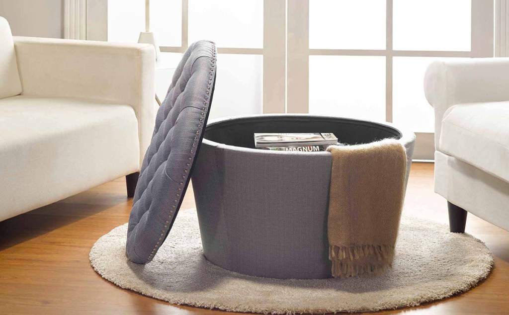 grey tufted ottoman with top open for storage