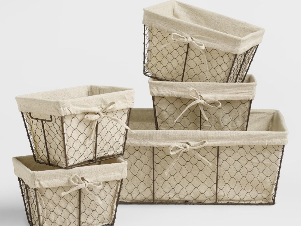 different sized wire baskets with white lining 