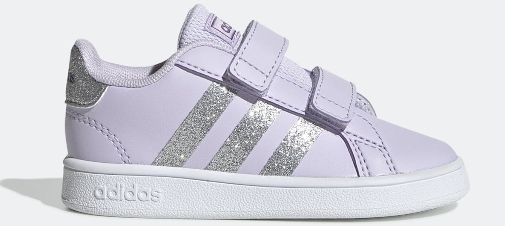 lilac colored adidas velcro sneaker with three glitter stripes