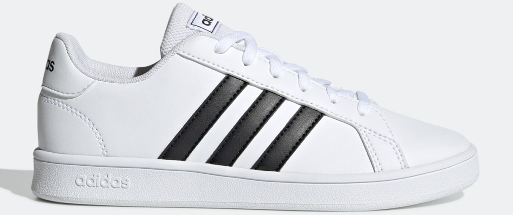 white adidas sneaker with three black stripes