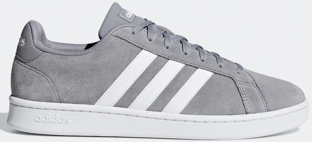 grey adidas sneaker with three white stripes and white sole