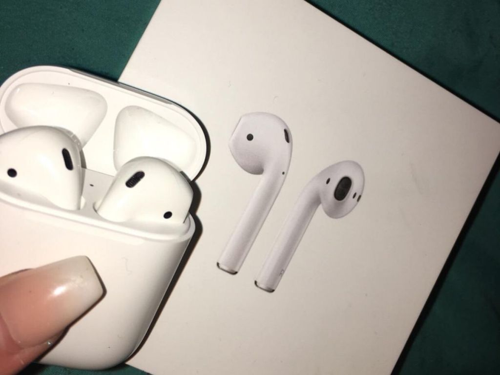 apple airpods in charging case with original packaging