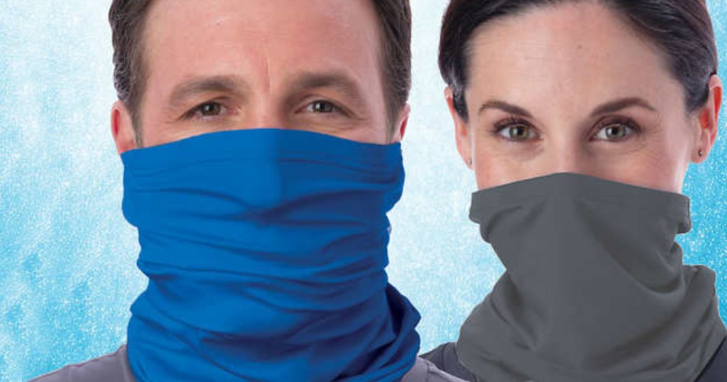 man and a woman wearing face masks