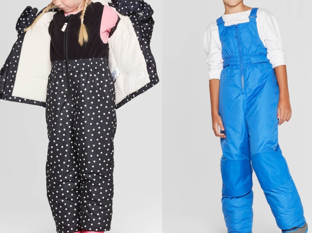 girl in black and white polka dot snow suit set and boy in blue snow pant