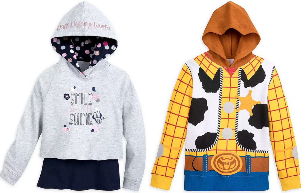 light grey cropped girls hoodie with black tank underneath and boys toy story woody hoodie