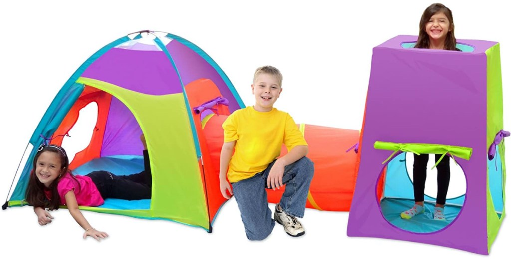 three children in large colorful play tent