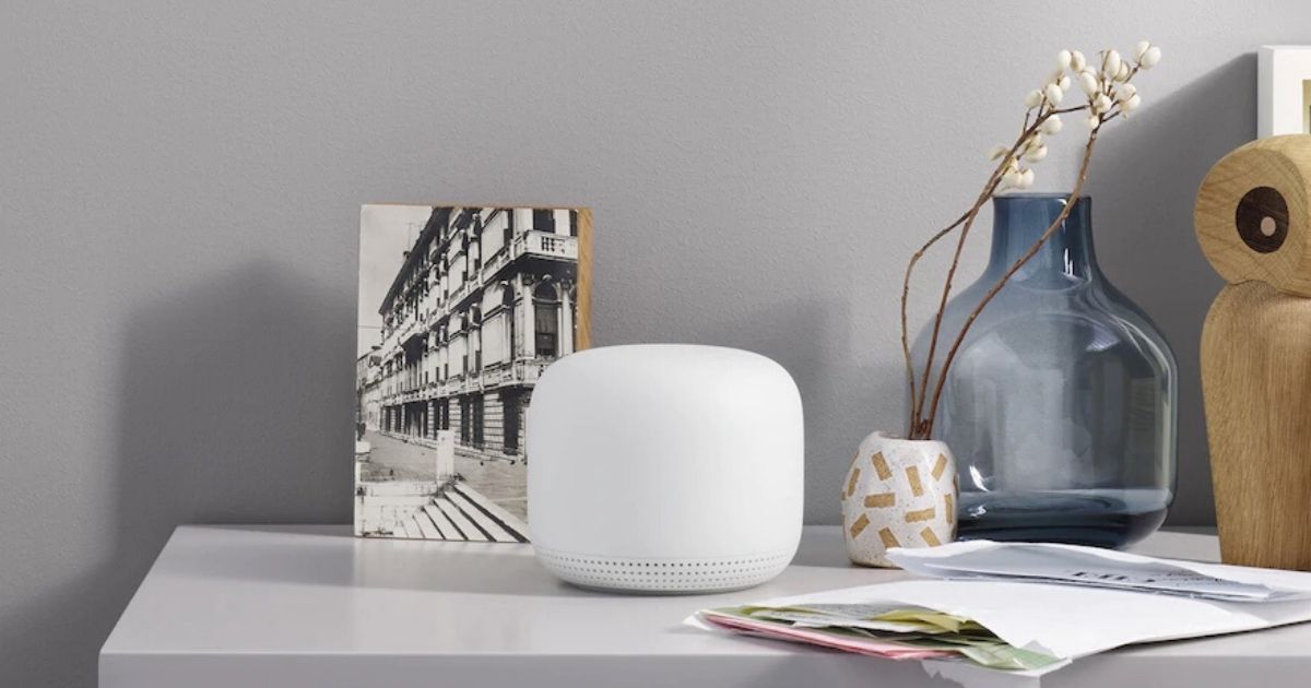 google nest on table with picture and vase 