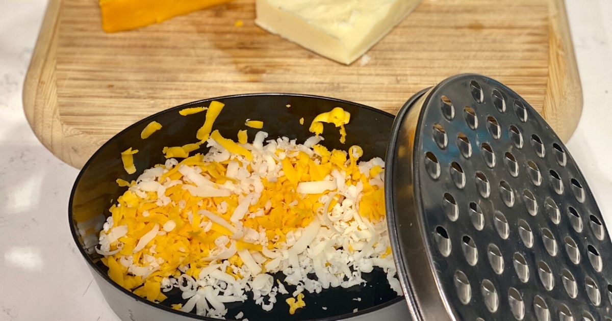 Grated cheese in the storage compartment of Amazon cheese grater