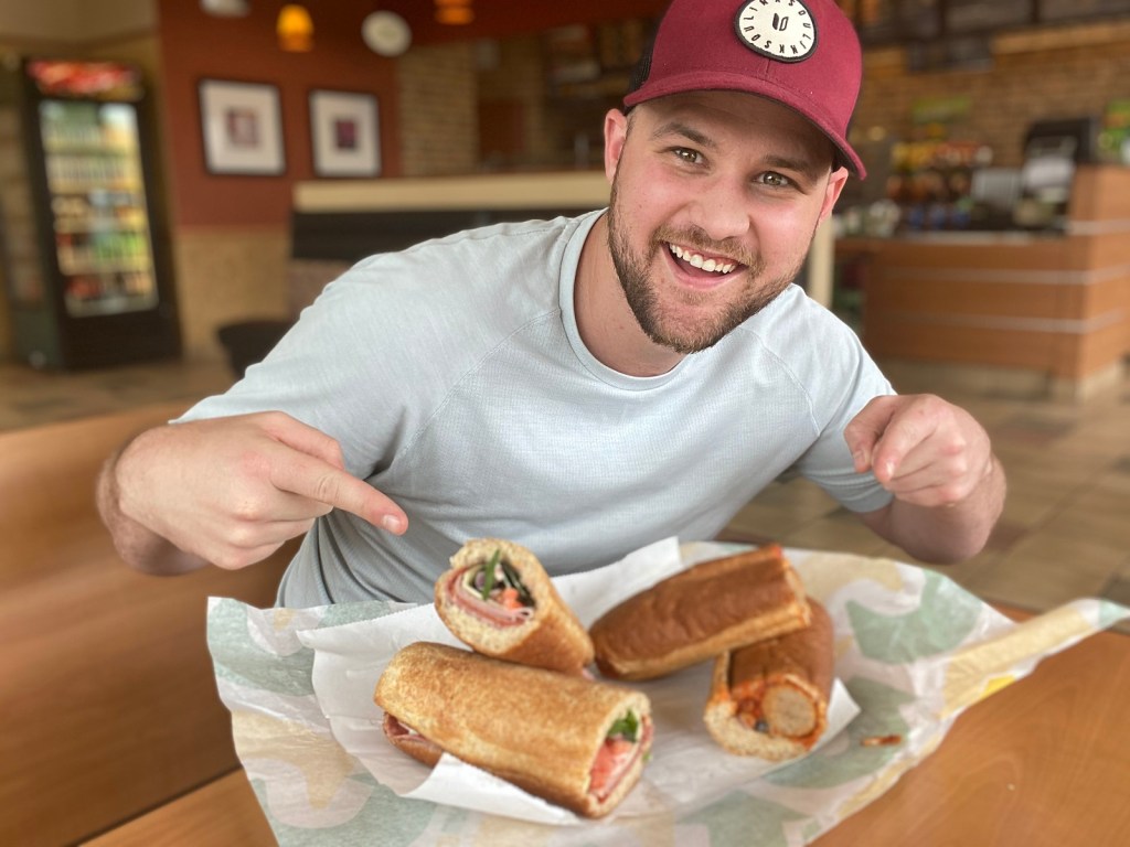 https://hip2save.com/wp-content/uploads/2020/05/Happy-man-with-Subway-footlongs.jpg?resize=1024%2C768&strip=all