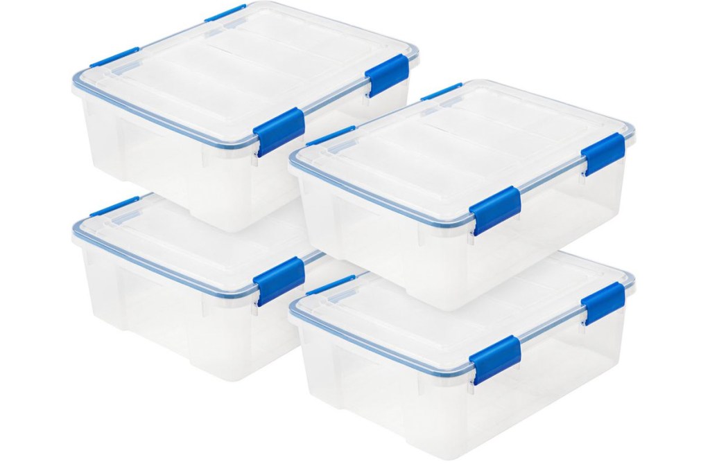 set of four clear storage containers with blue latching lids