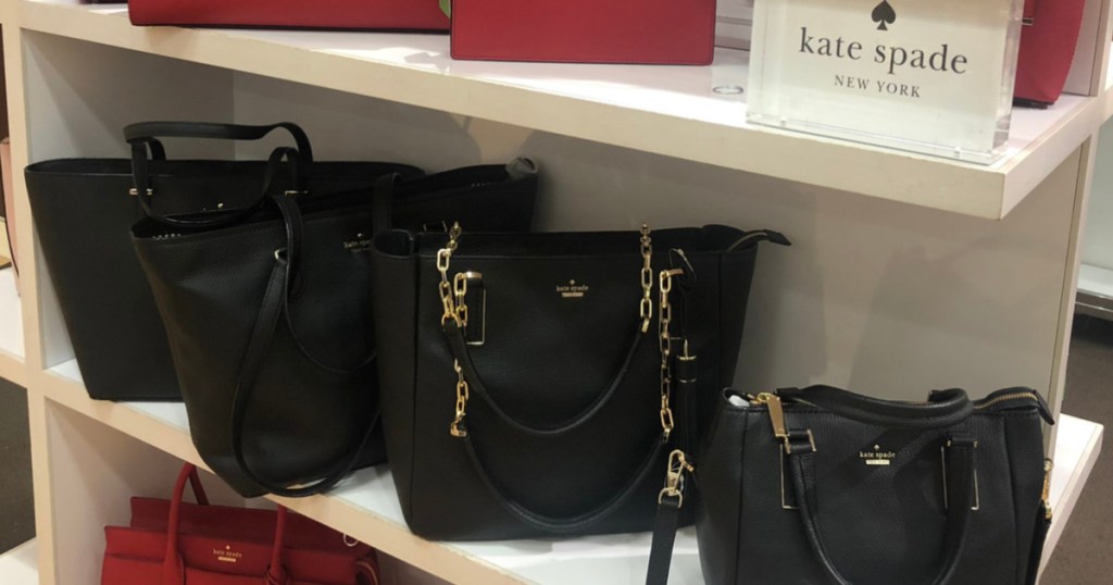 black designer handbags on store shelf