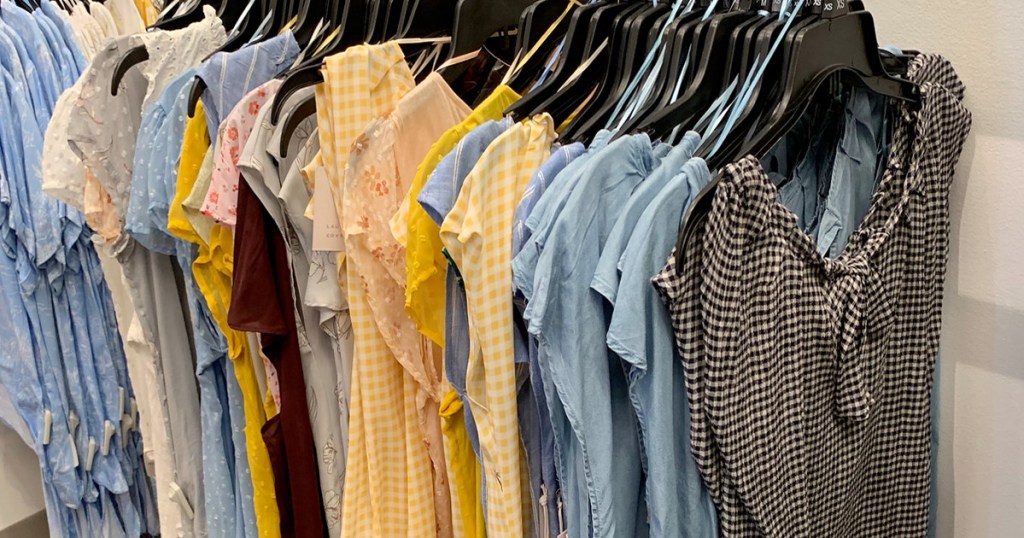 store display rack of various women's dresses