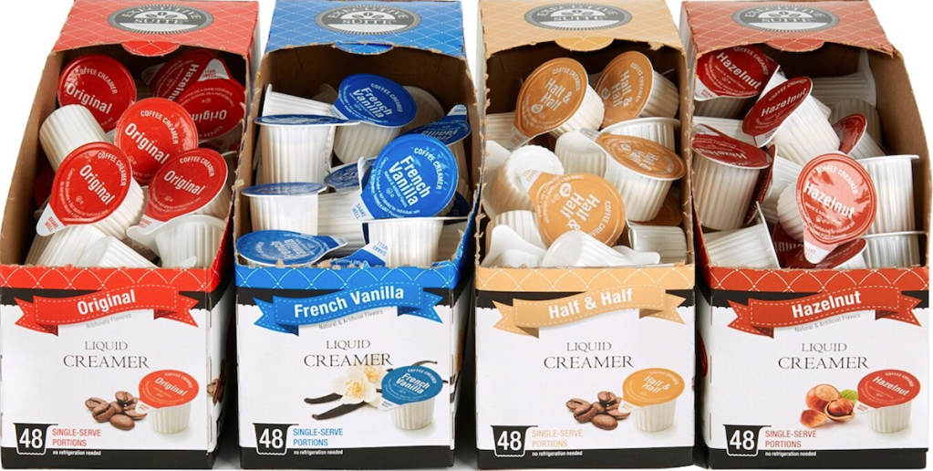 row of boxes of single coffee creamer packs
