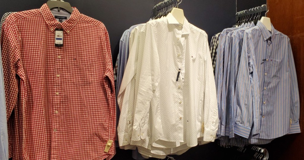 men's dress shirts handing on store wall