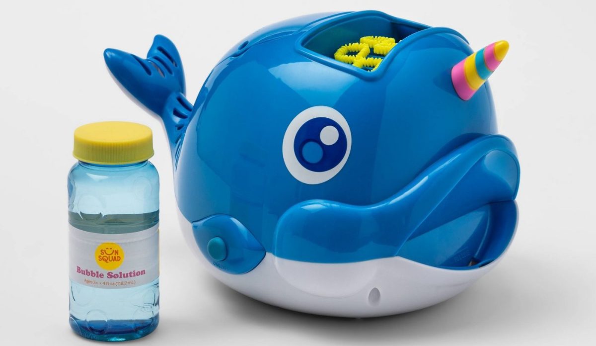 narwhal shaped small bubble machine and bottle of bubble liquid