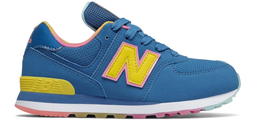 blue and yellow new balance kids shoe with multi color sole