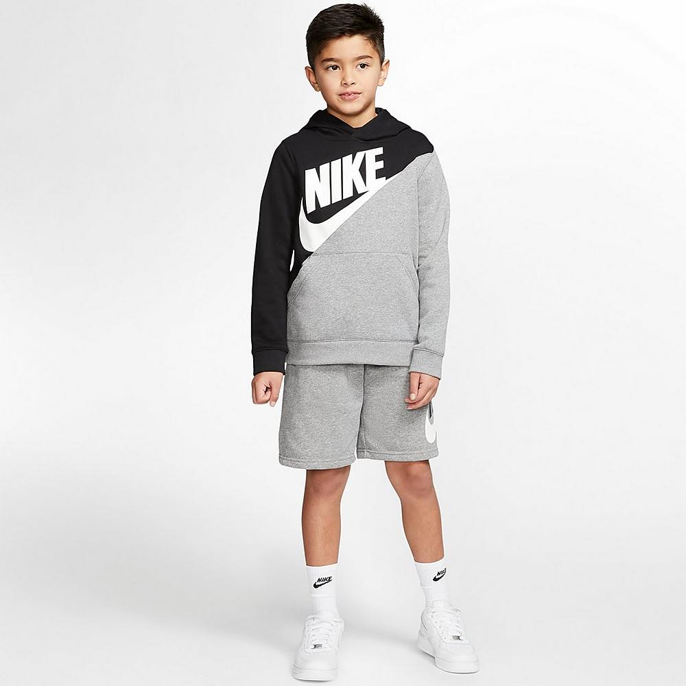 Boy wearing Nike Hoodie and Shorts