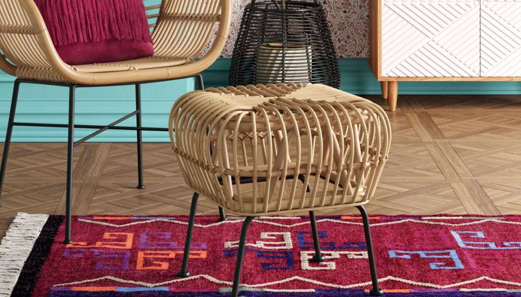Opalhouse Rhea Small Rattan Ottoman in living room with pink rug underneath