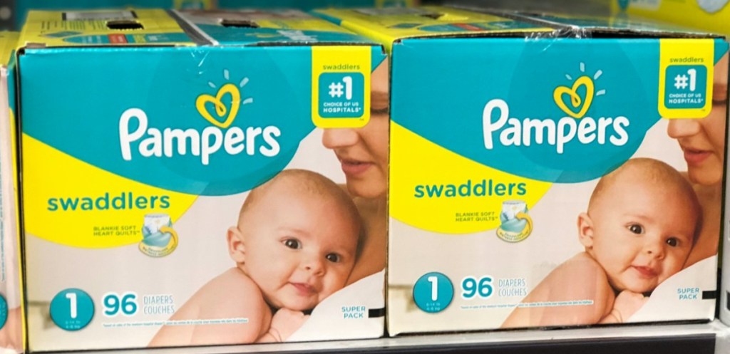 two big boxes of size 1 diapers on store shelf