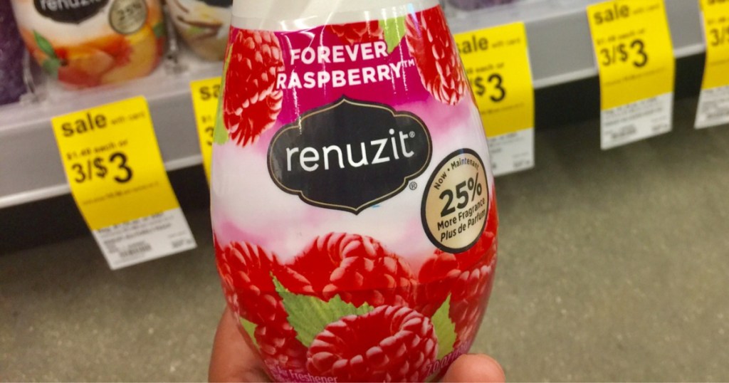 hand holding raspberry scented adjustable air freshener in store aisle