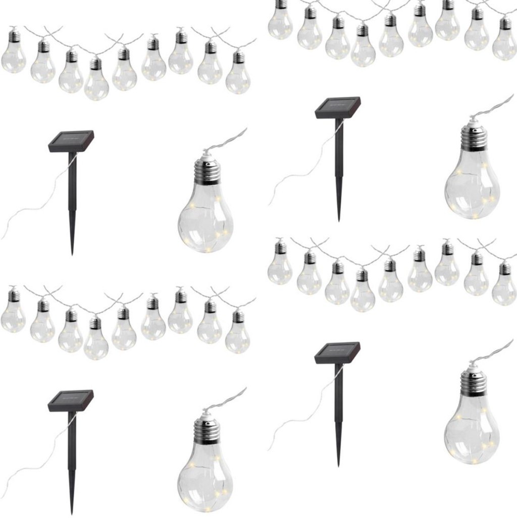 four strands of edison bulb style solar lights with solar stakes