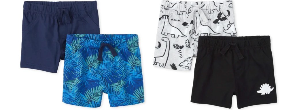 two 2-packs of baby boys shorts in navy blue, blue leaf print, white dinosaur print, and black