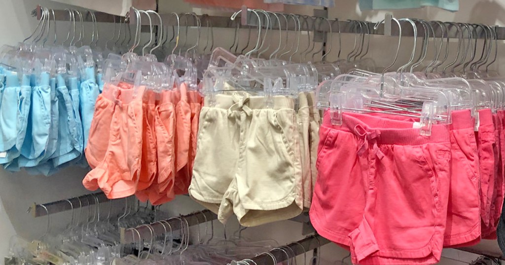 store display racks of colorful girls shorts