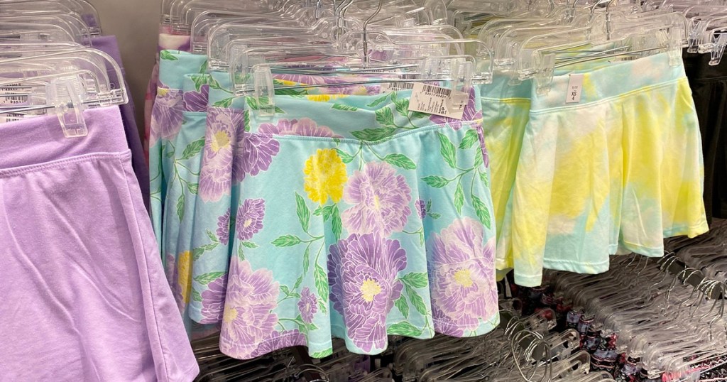 store display of girls skorts in various bright colors