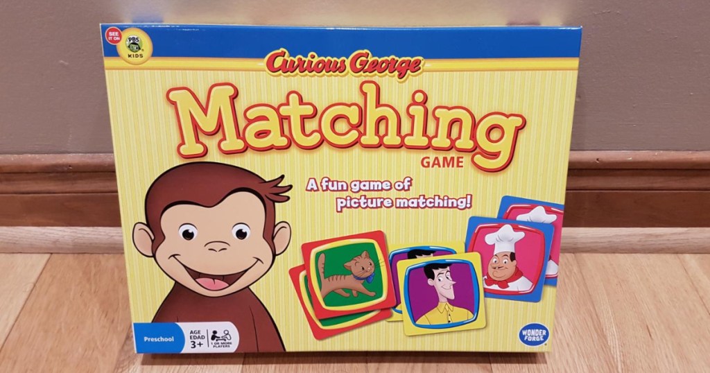 curious george memory game on table