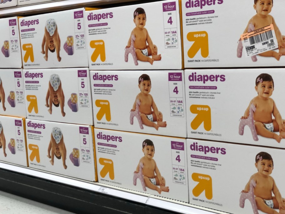 large boxes of diapers on shelf in store