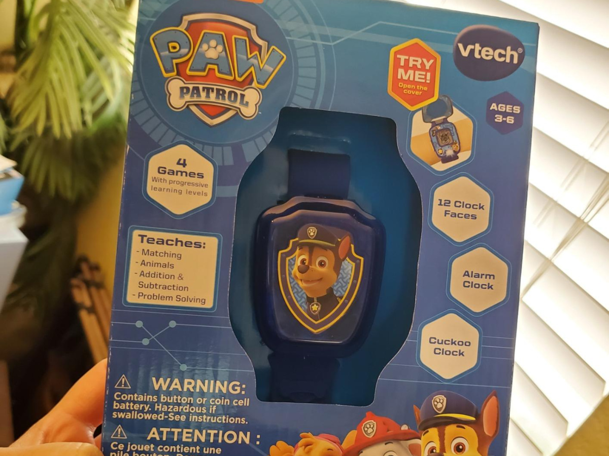 hand holding paw patrol watch box