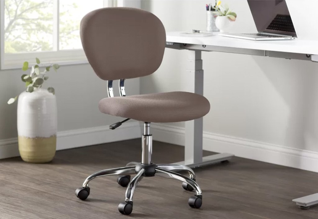 brown armless office chair in home office