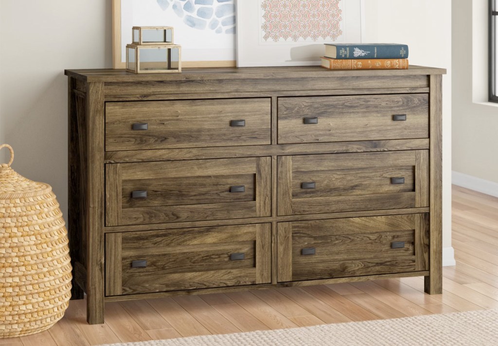 wooden 6 drawer dresser in bedroom