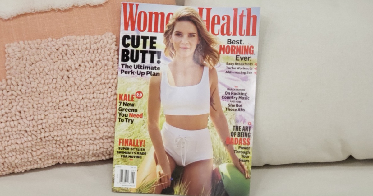 Women's Health Magazine propped up by pillows on a couch