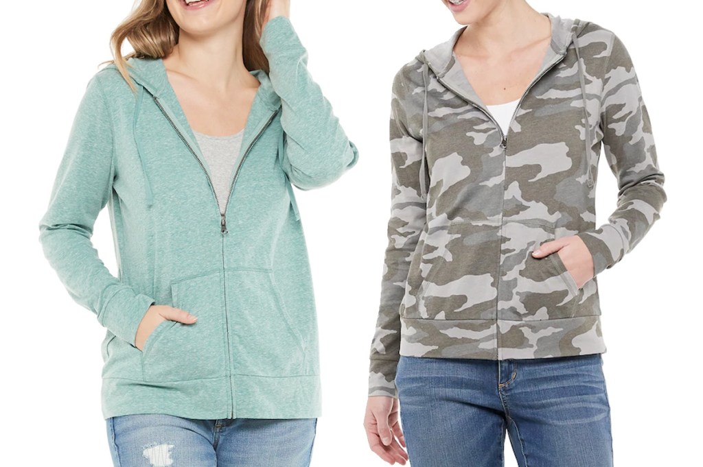 two women modeling zip-up hoodies in mint green and camo print