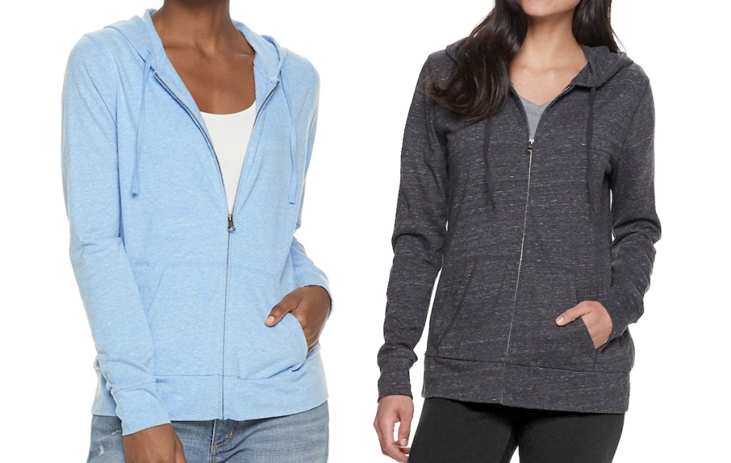 two women modeling zip up hoodies in light blue and grey colors