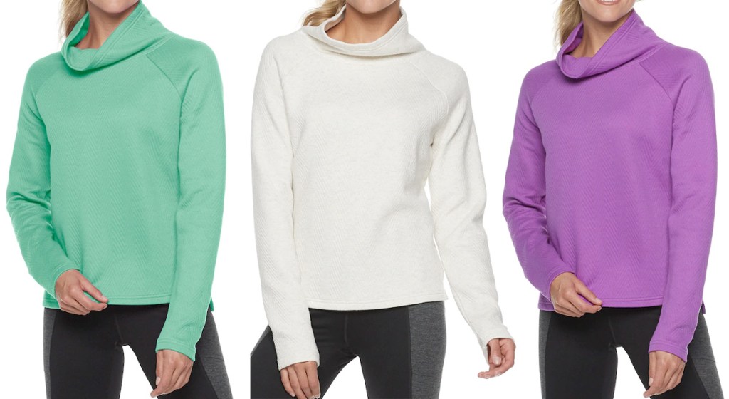 three women modeling sweaters with cowl necks in green, white, and purple colors