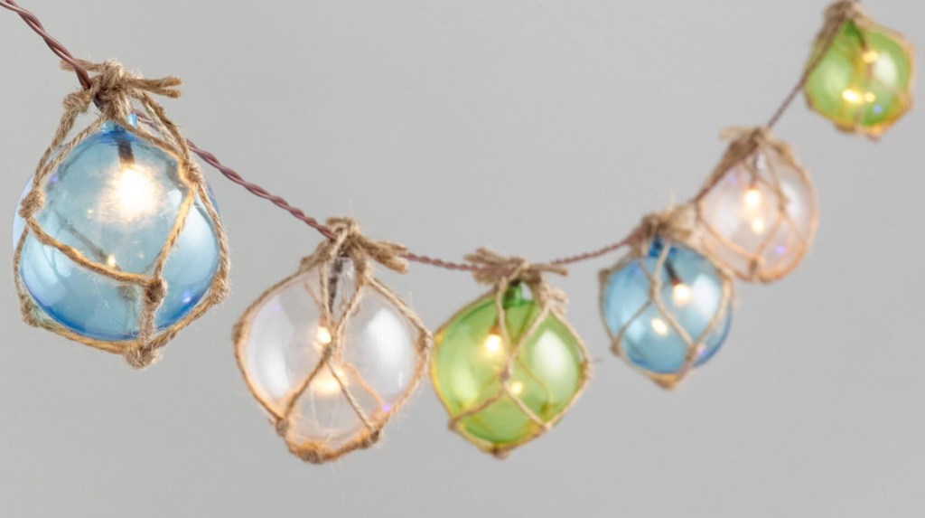 string lights with multi-colored bulbs wrapped in rope