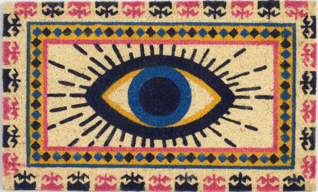 yellow and blue evil eye doormat