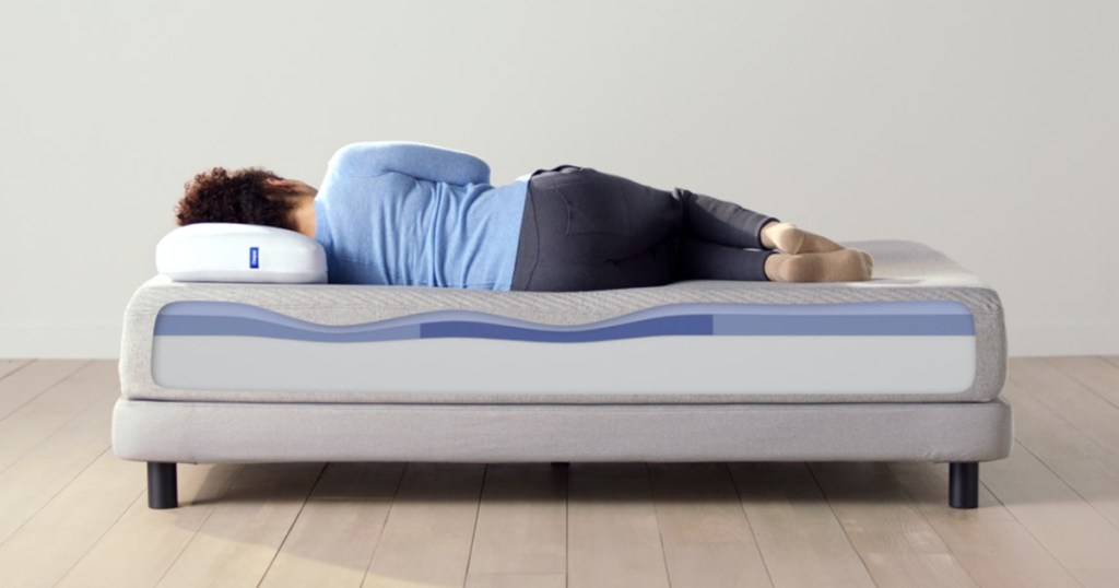 casper mattress cut out with woman laying down