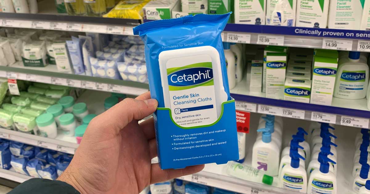 hand holding cetaphil cleansing wipes up in a store
