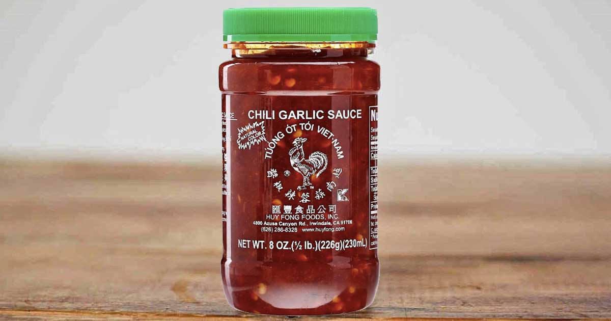 bottle of chili sauce on table that is part of the sriracha shortage