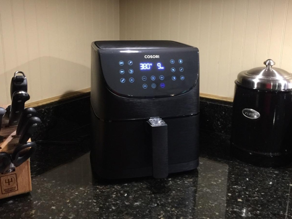 black cosori cooking appliance on kitchen counter