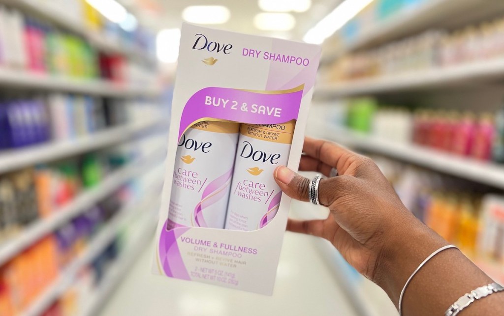 hand holding a value pack of dove dry shampoo