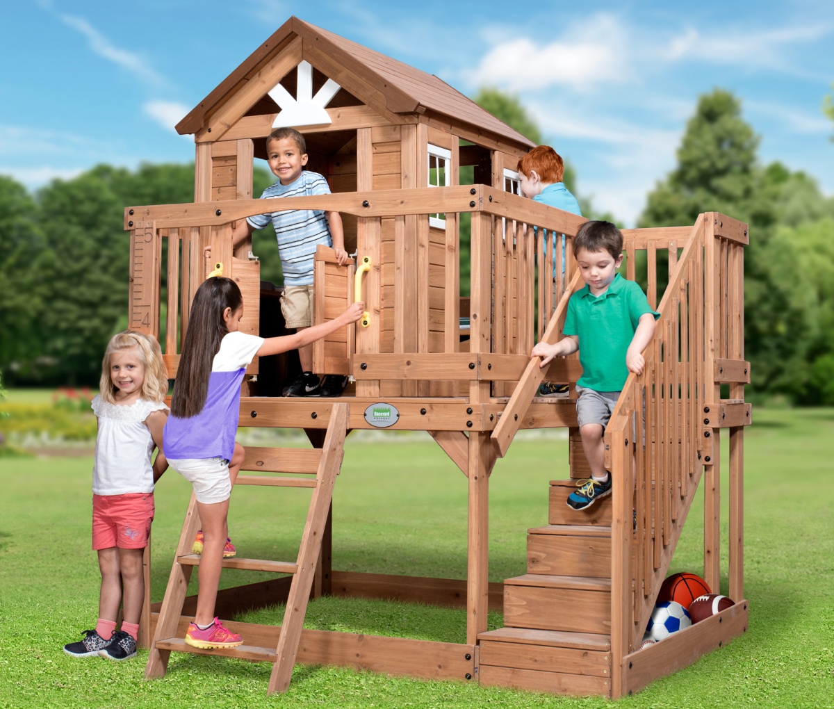kids playing in elevated playhouse