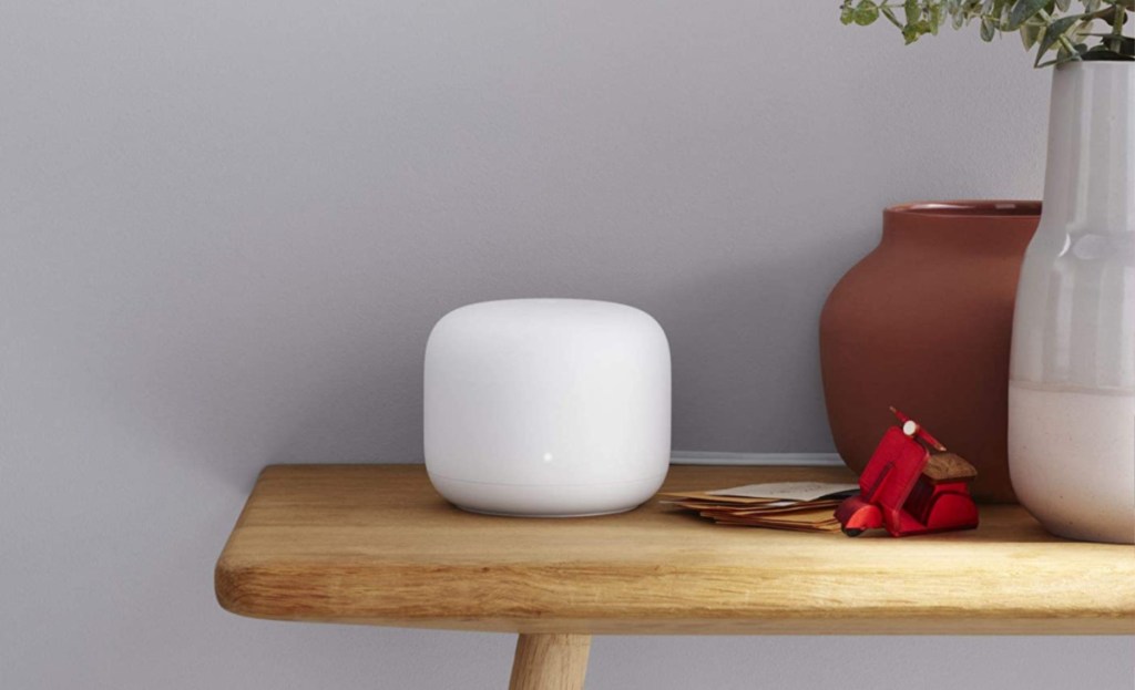 google wifi router on shelf with decor