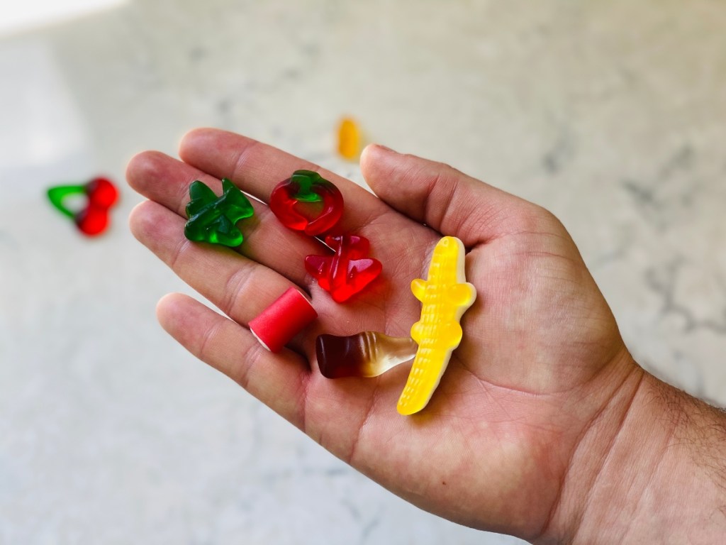 hand holding gummy candies